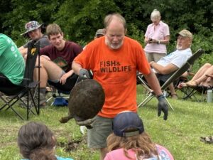 Denny Weiss leads an evening nature at Project AWARE