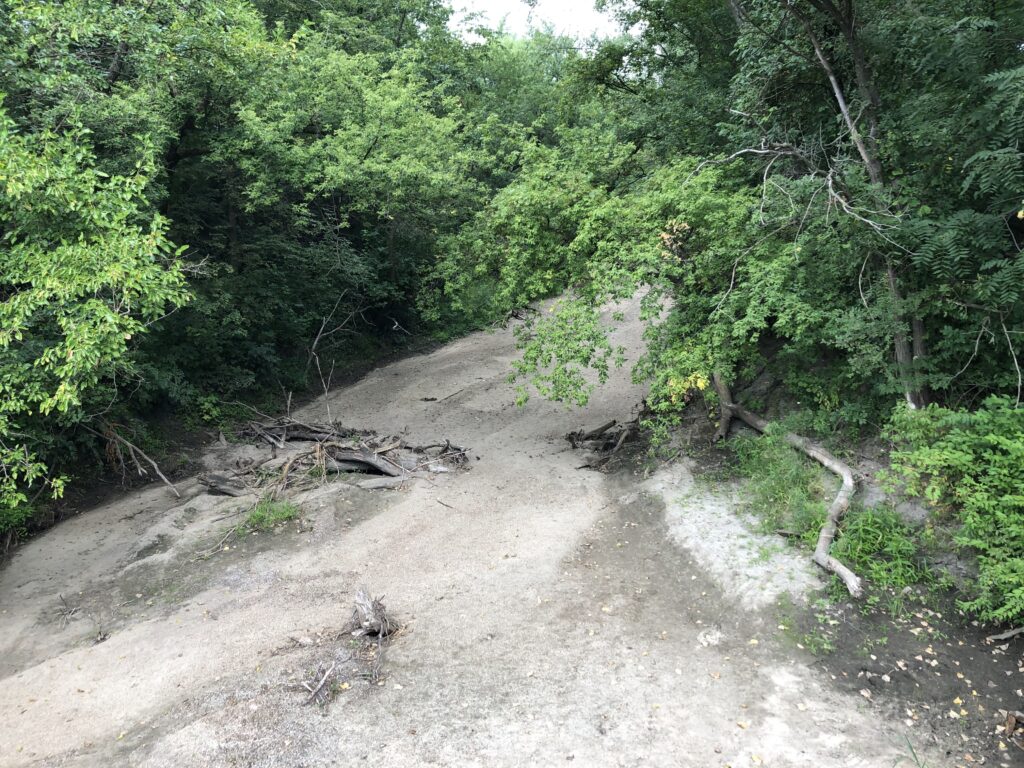 How often does a stream need flowing water to be protected?